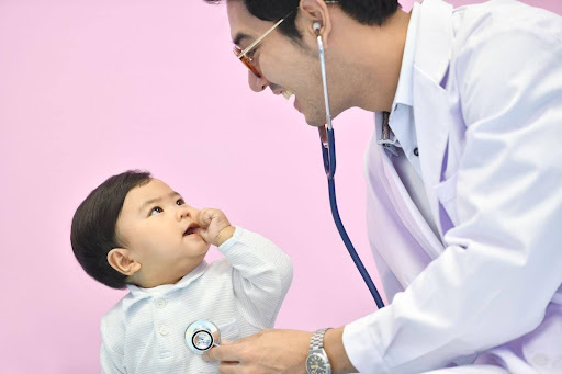 paediactric ent doctor treat a baby